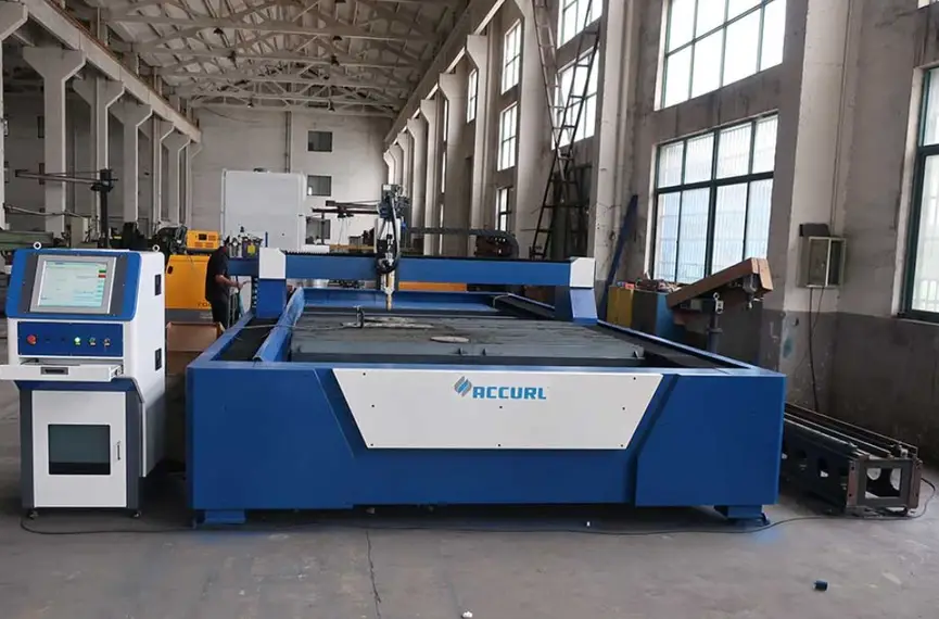A blue CNC plasma cutting machine in a workshop 