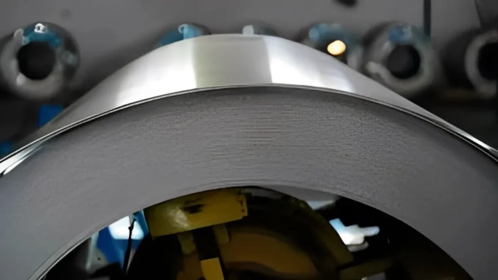 Close-up of coiled steel sheet.