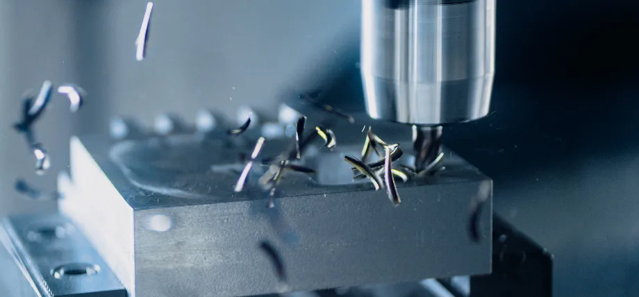 CNC milling close up of a workpiece and chips