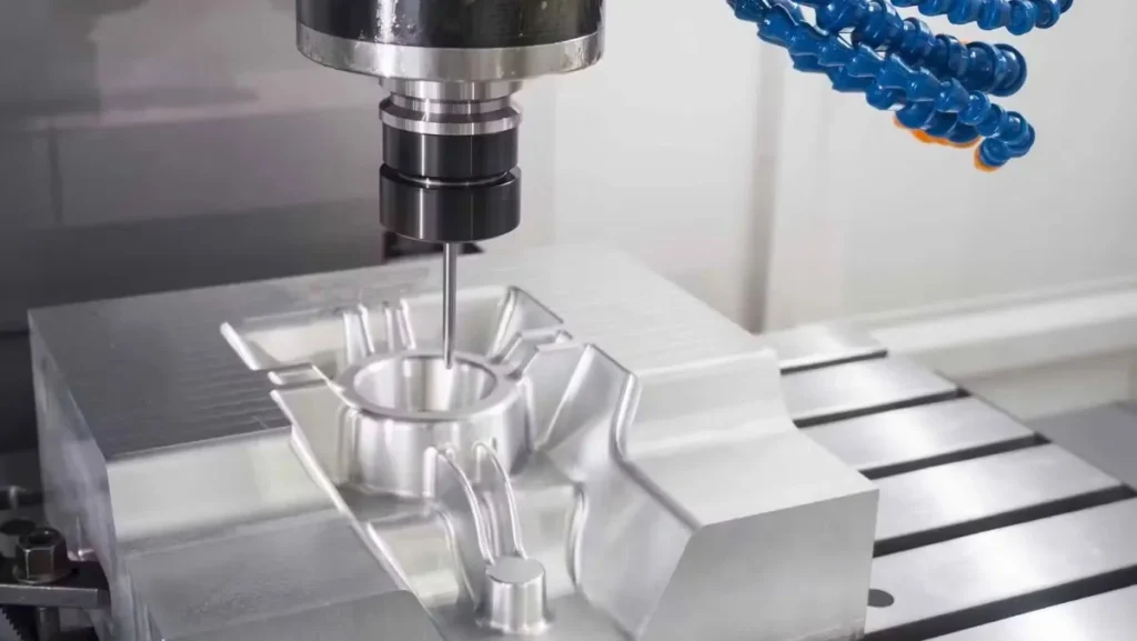 Close-up of CNC machine milling a metal part.