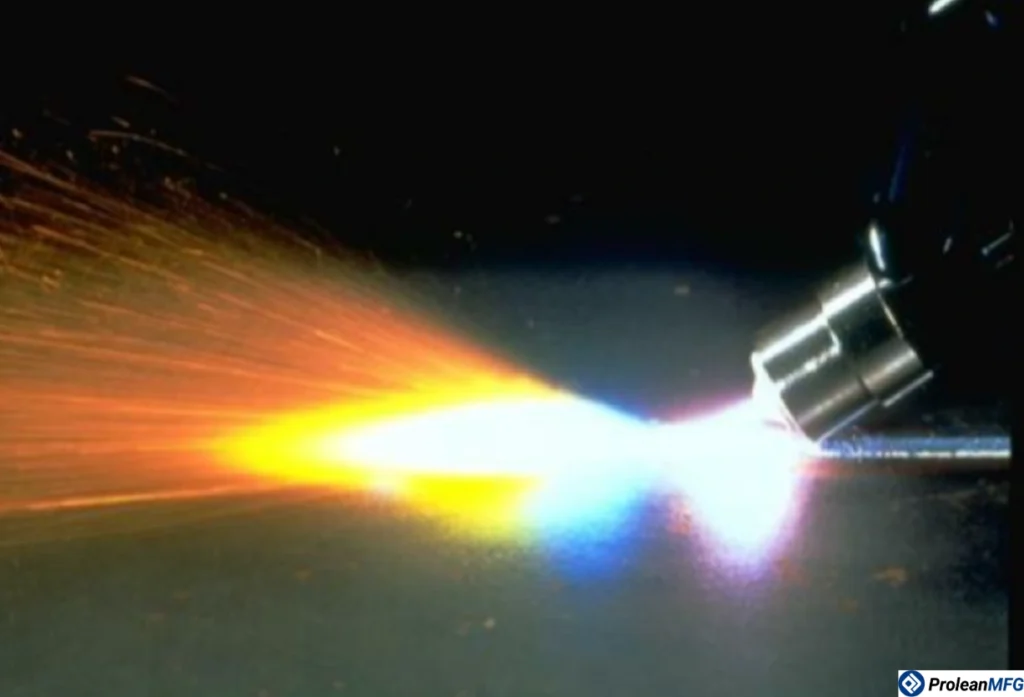 Close-up of underwater plasma cutting with visible arc glow and submerged workpiece