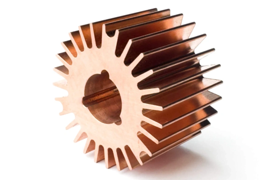 Red CNC-machined copper gear with center hole and three keyholes