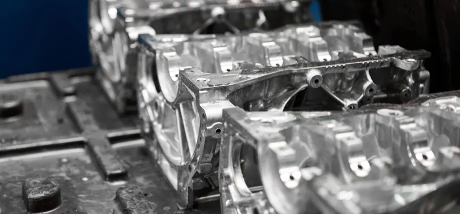 3 machined engines in an industrial setting