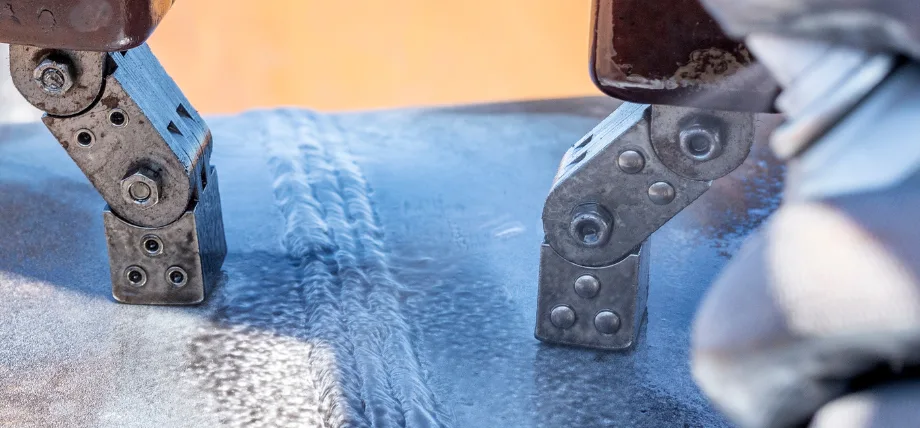 Magnetic particle testing (MPT), or magnetic particle inspection, to detect surface and slightly subsurface flaws in ferromagnetic materials.