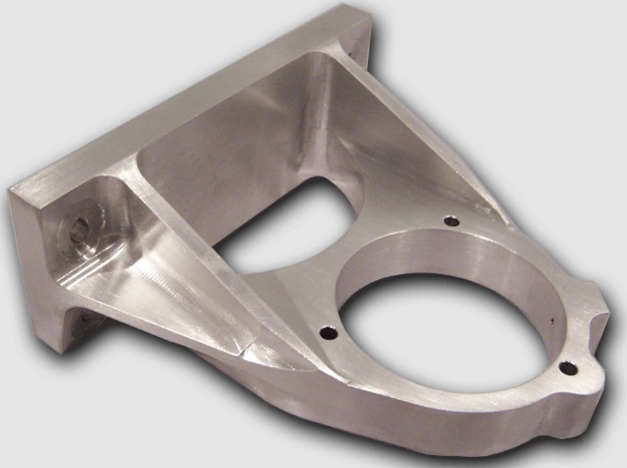 CNC-machined 7075 aluminum aerospace mounting bracket with pocketed and bored features