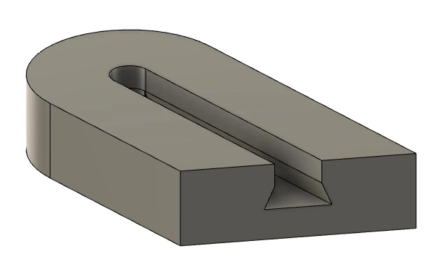 Dovetail undercut slot with angled walls in a machined metal workpiece