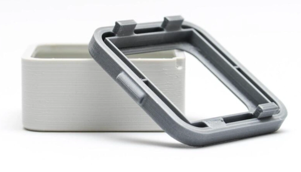 Snap-fit assembly with undercut interlocking features on plastic enclosure components