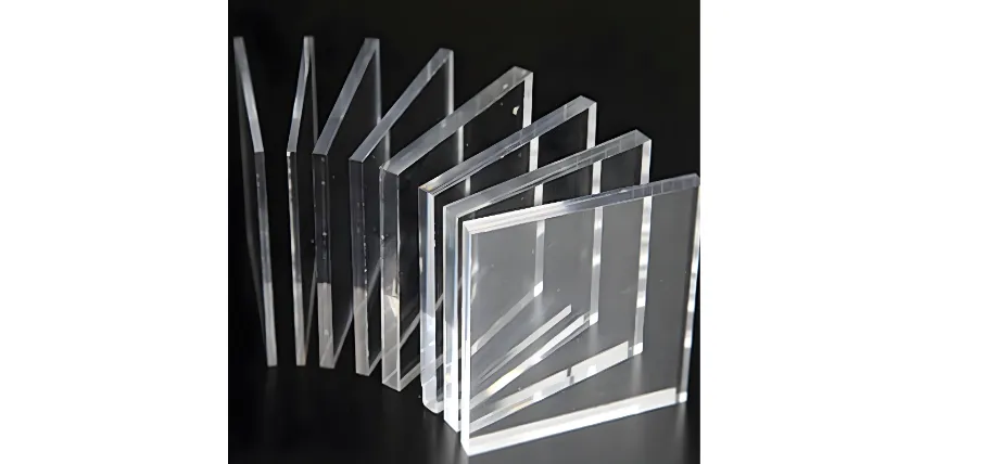 A variety of clear acrylic sheets in different thicknesses, representing the raw stock used for CNC milling and routing projects.