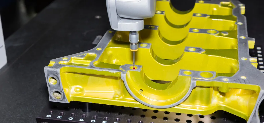 Precision CNC milling of a large yellow-anodized aluminum component with intricate internal cavities and contours