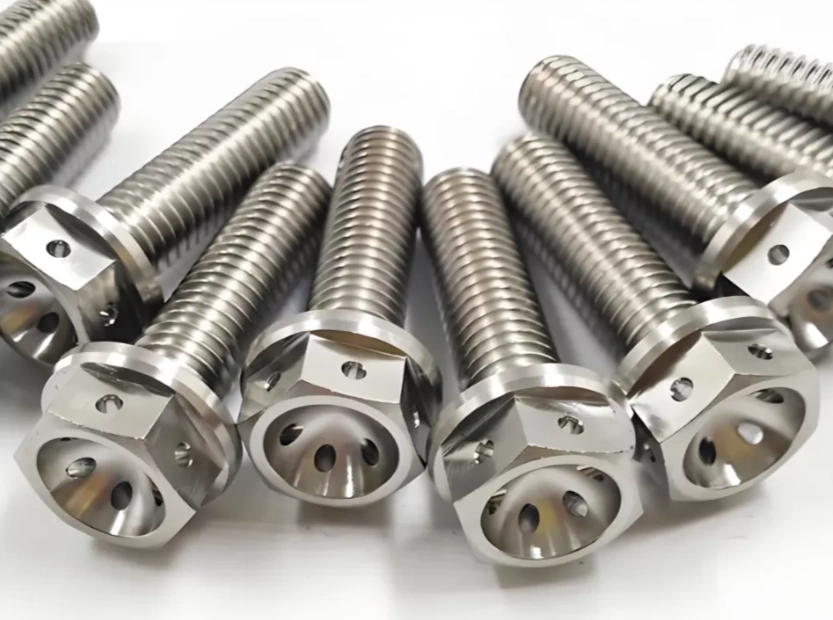 CNC-machined titanium hex bolts with drilled safety wire holes and fine machine threads