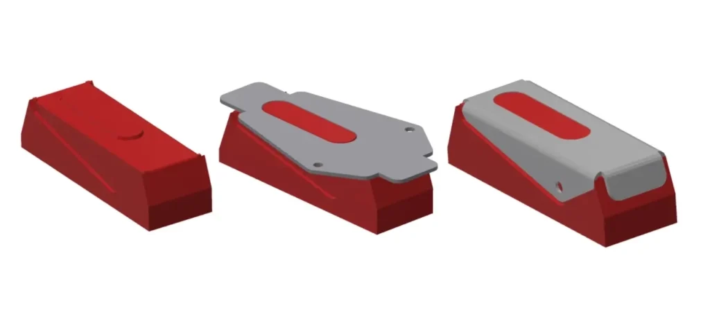 The image shows 3D printed dies used in tooling applications. These components are produced using additive manufacturing for rapid prototyping and short-run production.