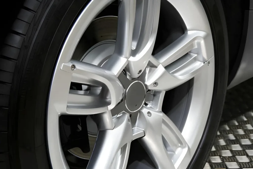 Image of a lightweight aluminum car wheel, designed for strength and reduced weight.