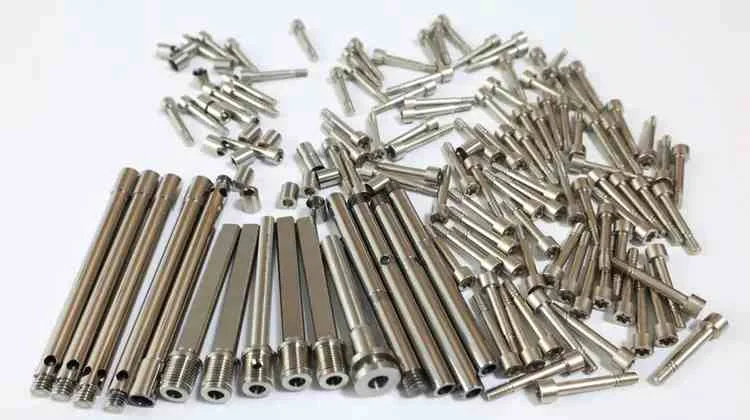 A collection of stainless steel parts in bulk made by CNC turning