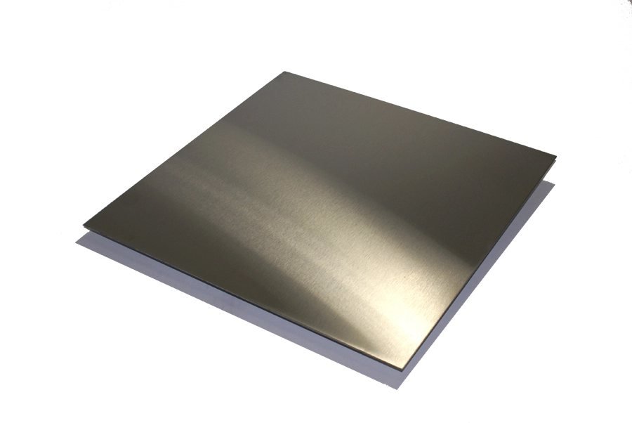 The image shows a flat sheet of stainless steel 316L used in industrial fabrication.