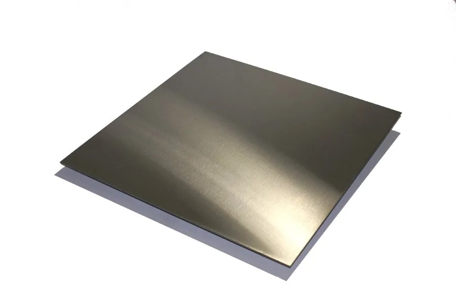 The image shows a flat sheet of stainless steel 316L used in industrial fabrication.