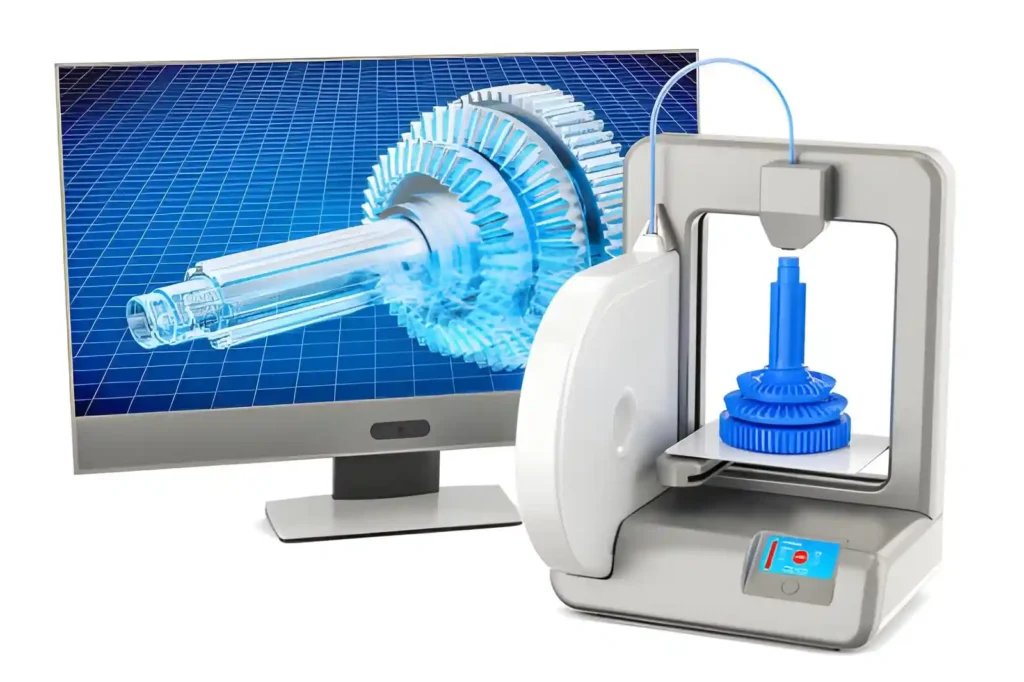 The image shows a 3D printer connected to a computer monitor, with a 3D model displayed on it. The printer is positioned on a flat surface, and the screen shows a digital rendering of a part design.