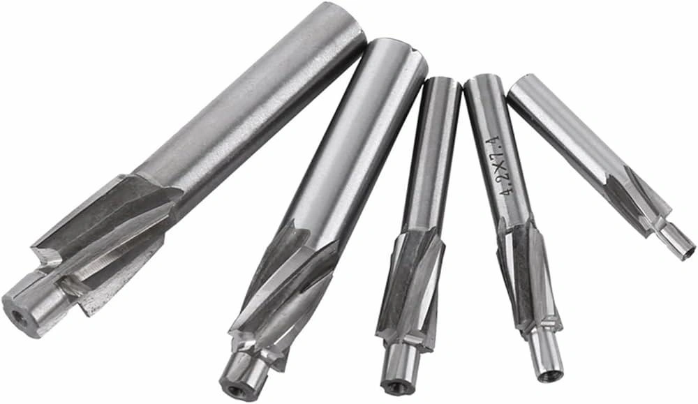 An image illustrating five countersink end mills with varying sizes
