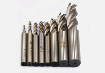 Set of HSS end mill bits arranged by size from small to large
