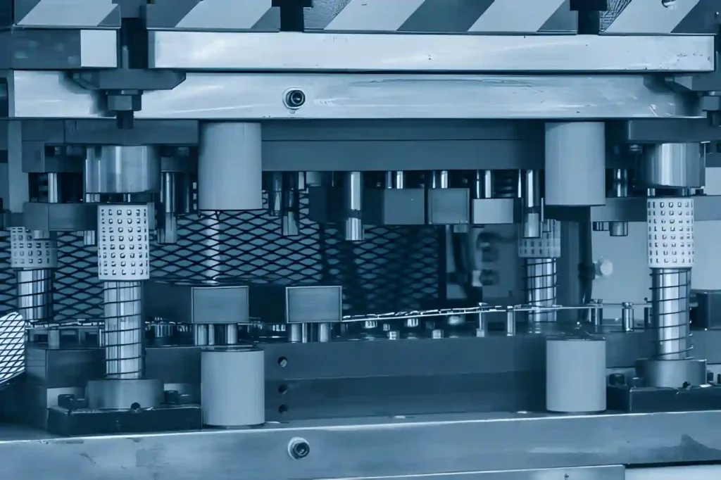 The image shows a progressive die stamping machine used for high-volume production of metal parts.