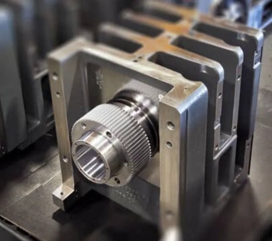 Complex CNC-machined aluminum housing with ribbed structure and precision-threaded cylindrical bore