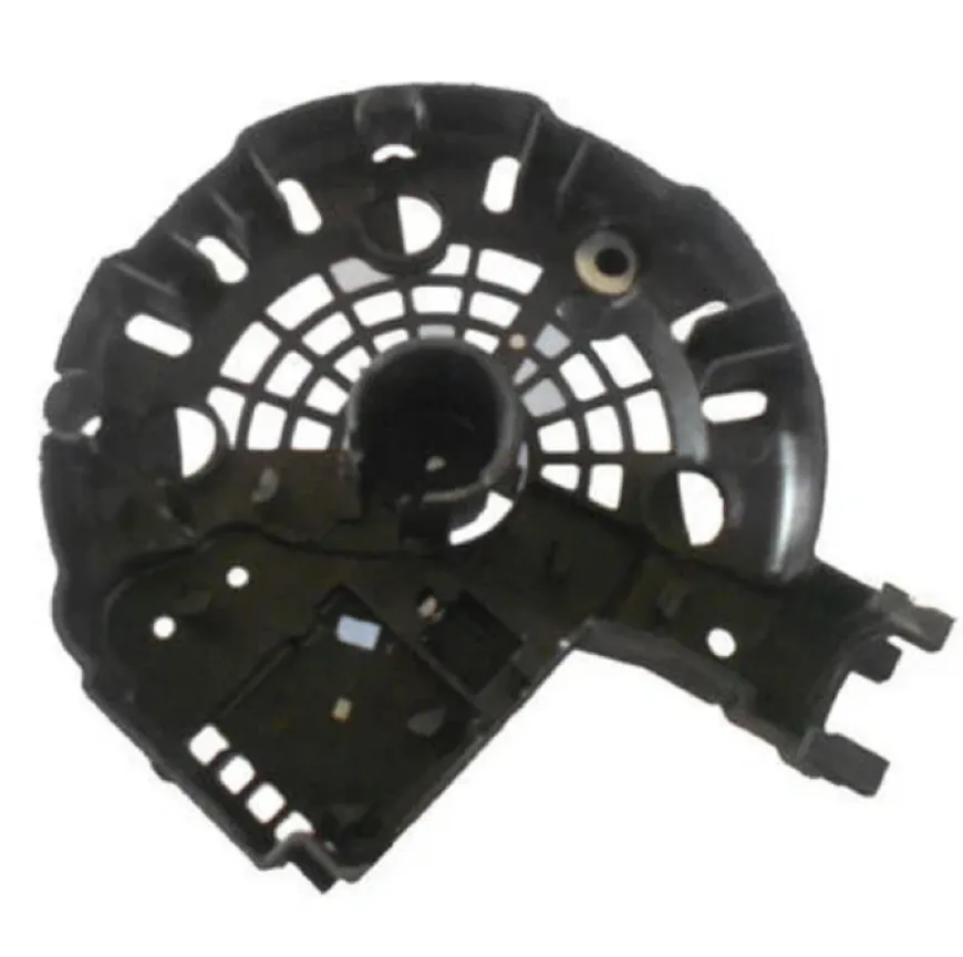 Black polypropylene prototype of a circular structural housing component with ribbed lattice pattern and mounting clips