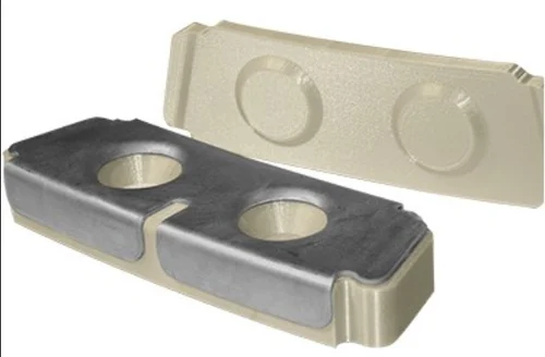 Metal insert overmolded with beige plastic housing.
