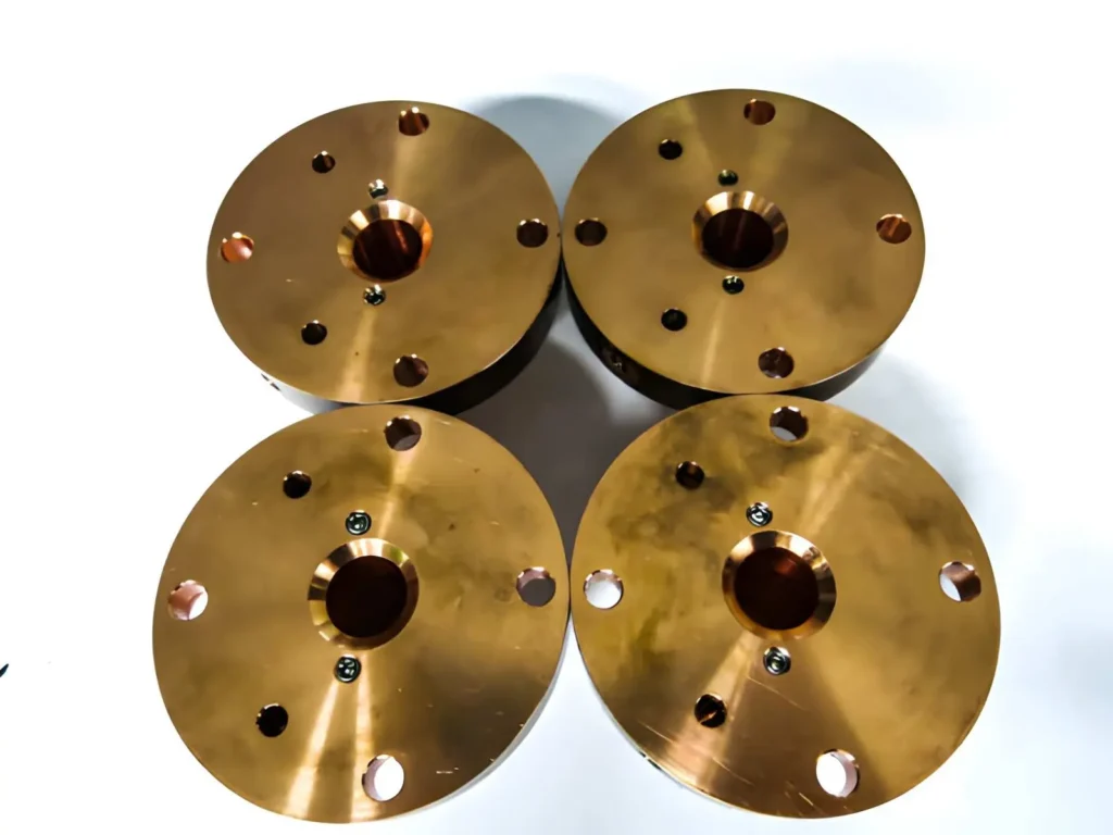 Machined copper parts made from raw copper pipe used for cooling applications