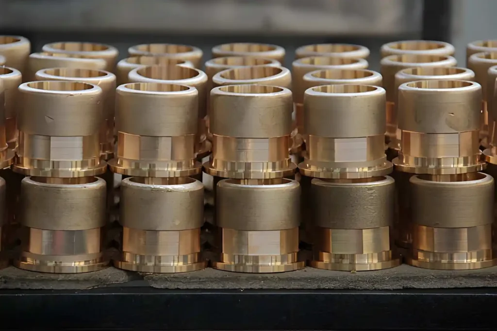 Precision-machined copper mechanical parts ready for assembly.