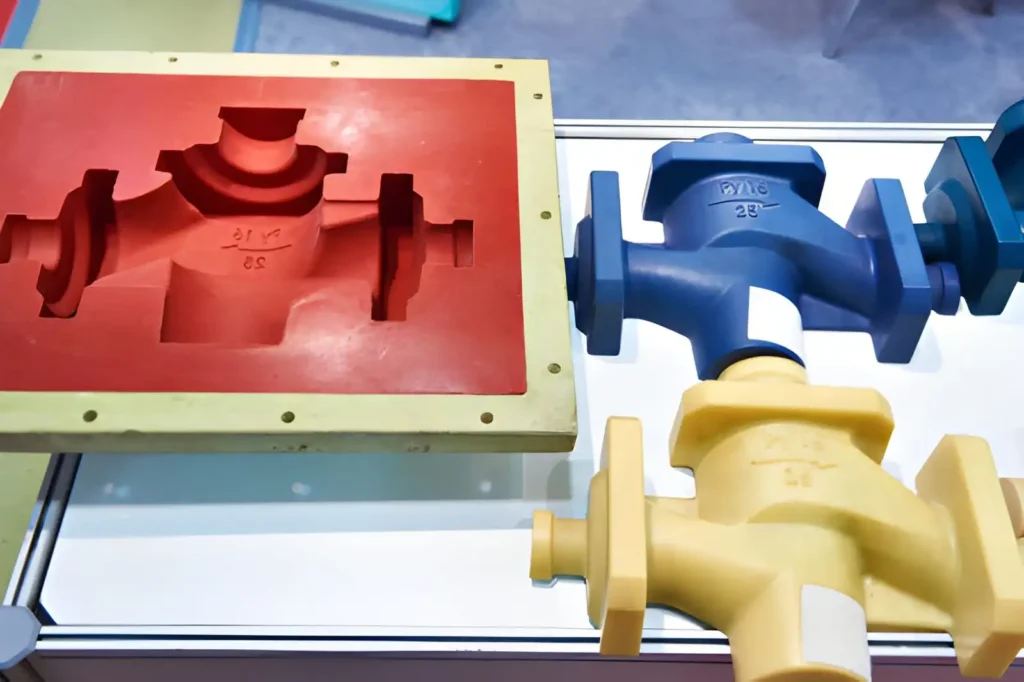 The image shows close-up custom vacuum cast parts used in plumbing applications with smooth molded surfaces