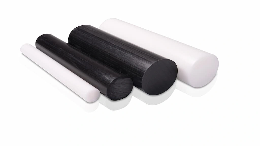 White and black rods of Delrin homopolymer