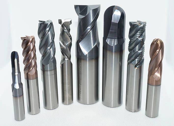 An image showing eight different end mill tools 