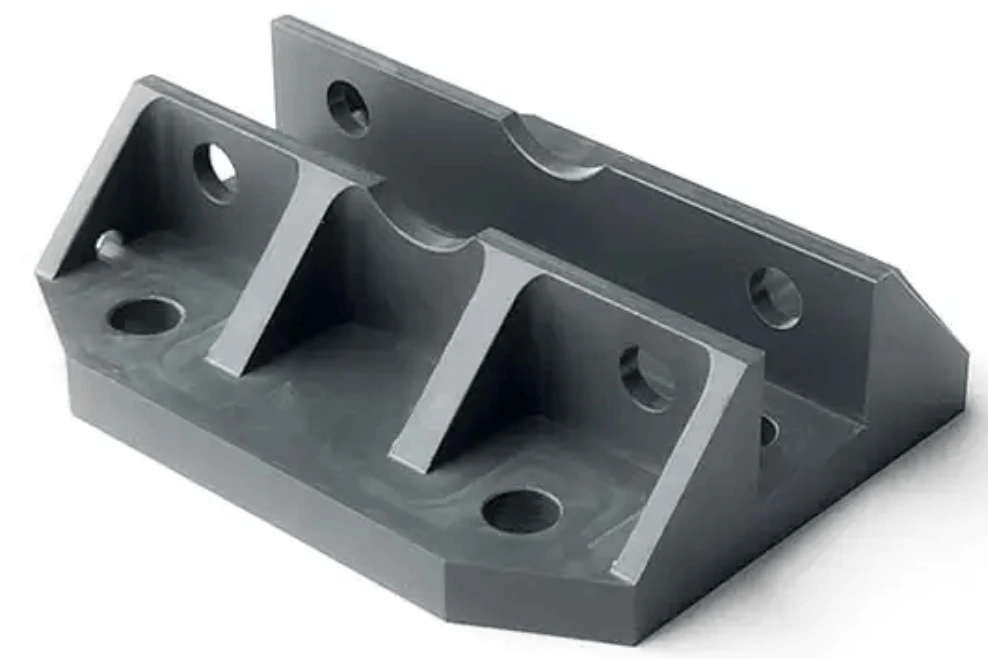 CNC-machined grey PVC structural support bracket with mounting holes and internal ribbing