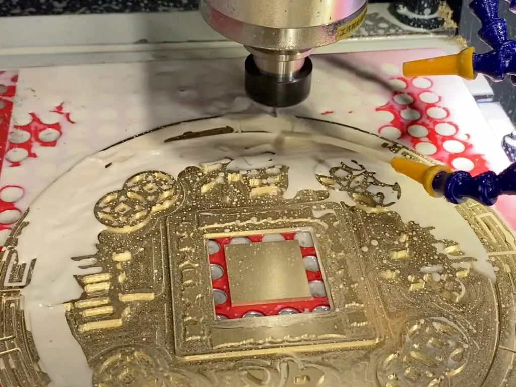 Intricate design patterns on a bronze surface