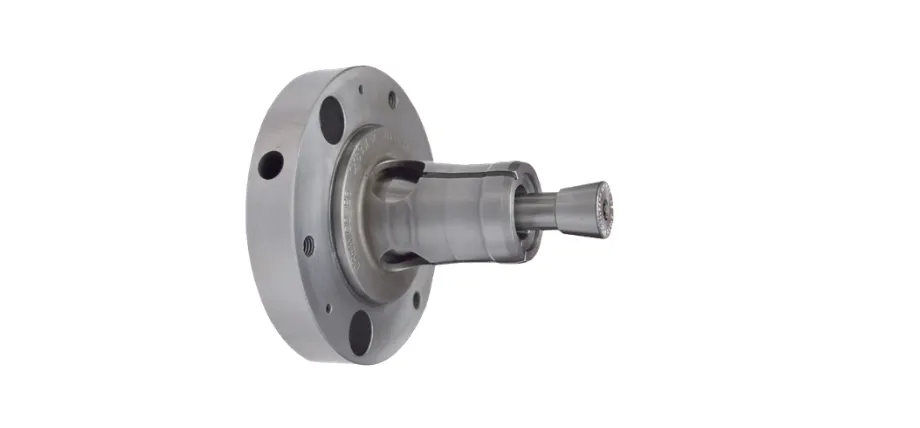 A silver metal expanding mandrel and collet chuck assembly used for securing cylindrical parts during internal machining