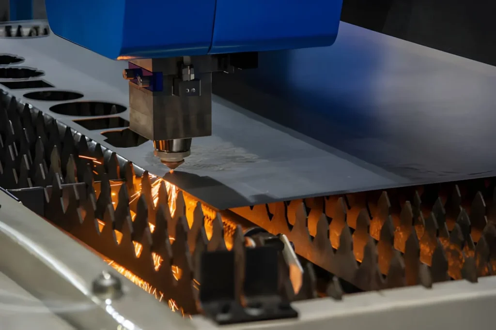 The image shows a CNC fiber laser cutting machine cutting a metal plate with visible sparks.