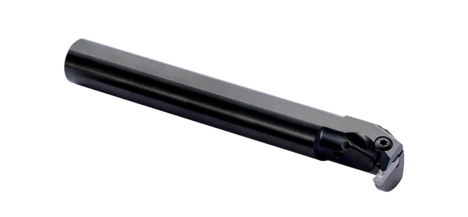 An indexable profiling and grooving tool holder with a pre-mounted carbide cutting insert, isolated on a white background.