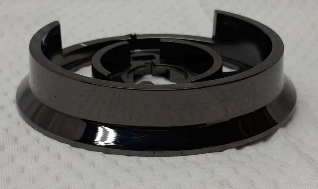 Circular metal ring component with a glossy black nickel plating finish