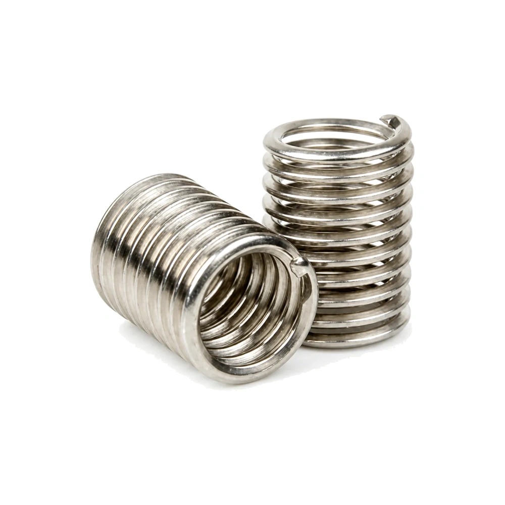 Electroless nickel plated thread inserts