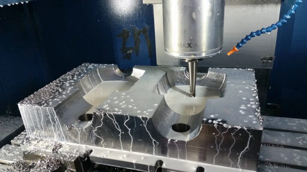 A close-up view of large component machining in a CNC milling machine