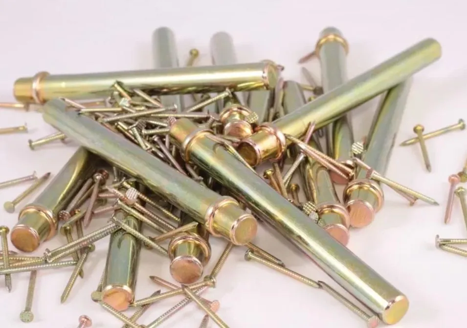 Nails and cylindrical metal fasteners with an iridescent yellow zinc plating finish