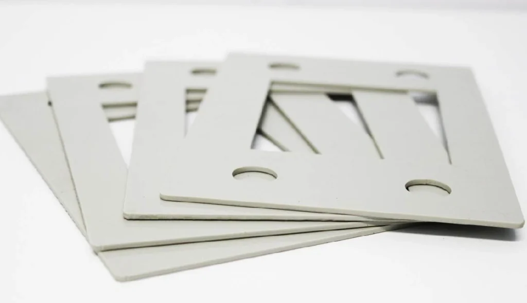  Stacked laser-cut polypropylene sheets with precision slot cutouts  