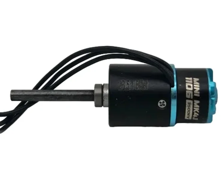 Small brushless motor with precision-machined output shaft and coiled lead wires.